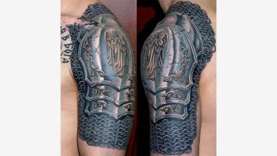 Awesome Tattoo Looks Like Suit Of Armour