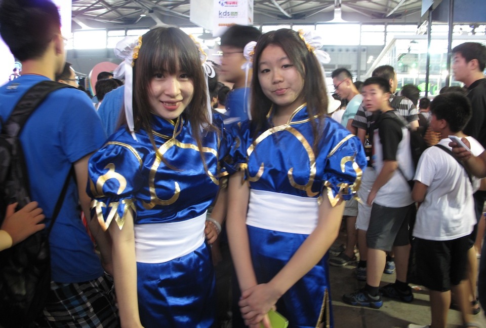 Geeks, Games, And Extremely Bored Booth Companions At China Joy 2013