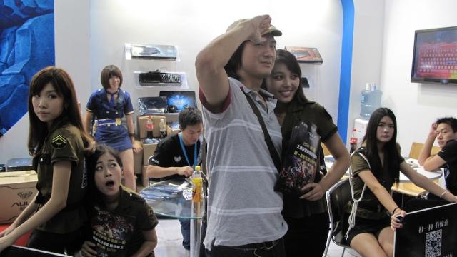 Geeks, Games, And Extremely Bored Booth Companions At China Joy 2013