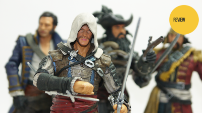 I’m Playing Assassin’s Creed IV Right Now. On My Desk. With Toys.