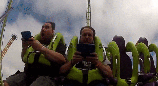 I Can’t Stop Watching Dudes Try To Play Mario On A Roller Coaster