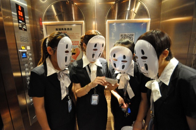 Chinese Employees Relieve Stress With Studio Ghibli Masks