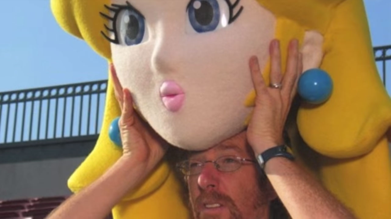 Nintendo Fan Account Flagged On Twitter For Image Of Man Putting On Princess Peach Mask