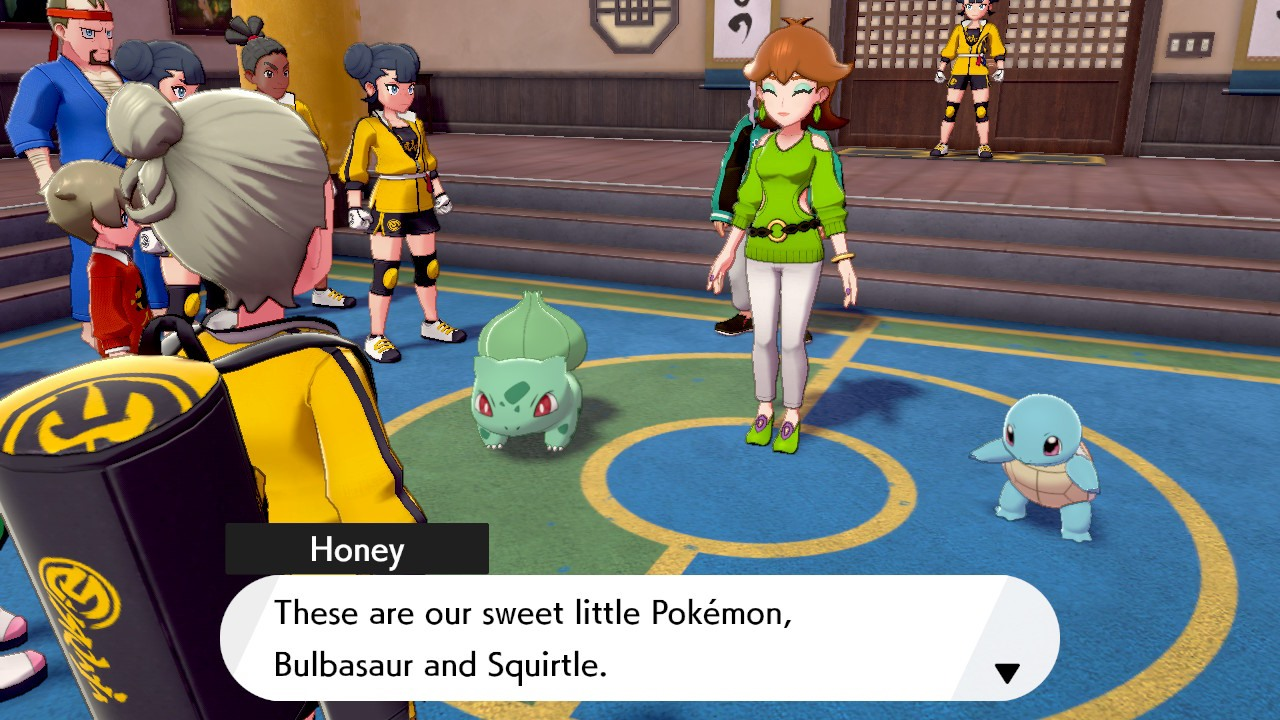 If you don't already have a Bulbasaur or Squirtle to import from another game the owners of Isle of Armour's dojo will give you one of them as a gift.  (Screenshot: Nintendo, Kotaku)