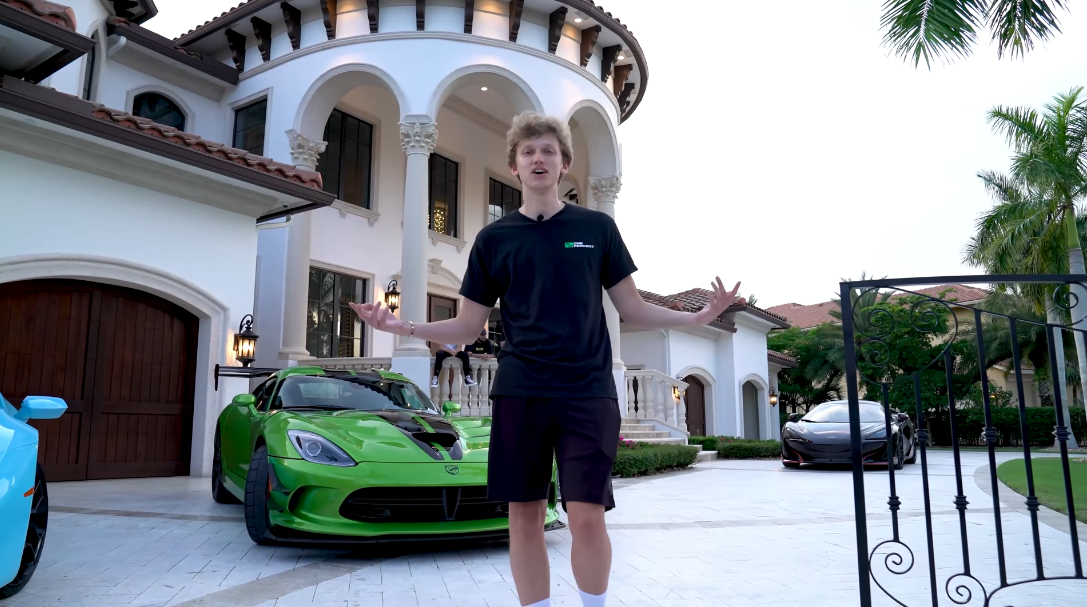 Youituber Formula standing outside the new mansion he just co-purchased with other Fortnite players.  (Screenshot: One Per cent)