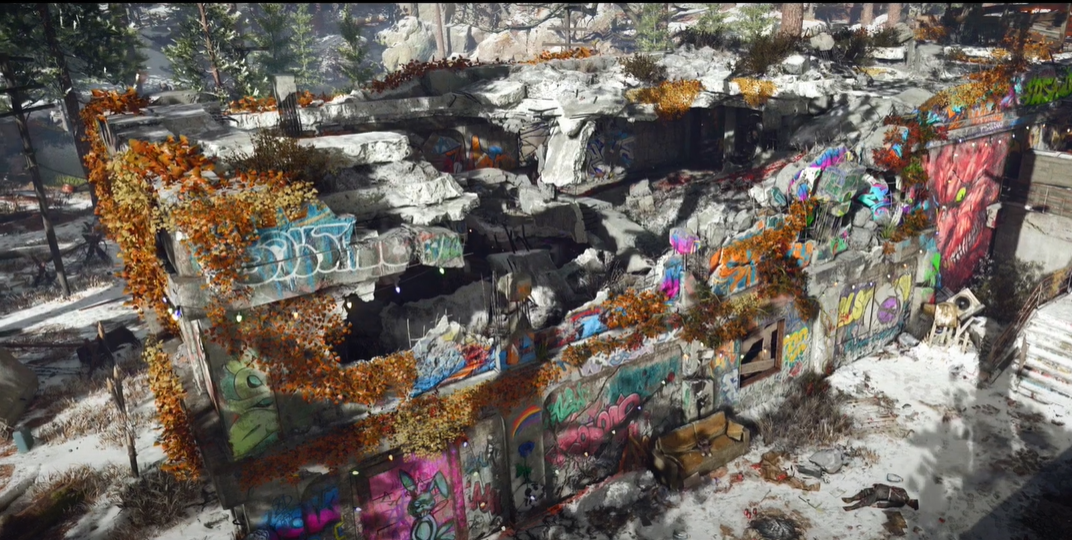 Don't know how the walls of this building got hit with so much graffiti, what with the undead hanging around, but I'm totally here for it.  (Screenshot: YouTube: Activision)