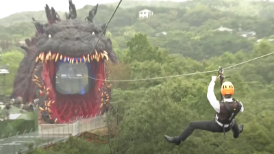 Watch People Zipline Into Godzilla’s Mouth