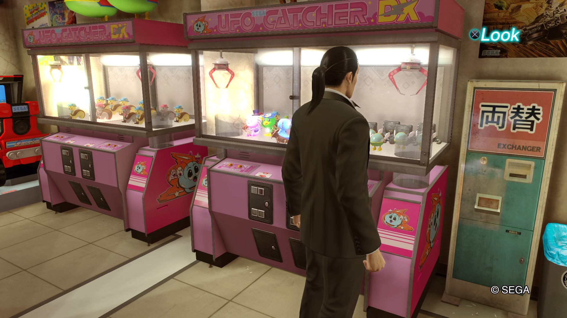 Ironically, this crane game is also UFO themed. (Screenshot: Sega)