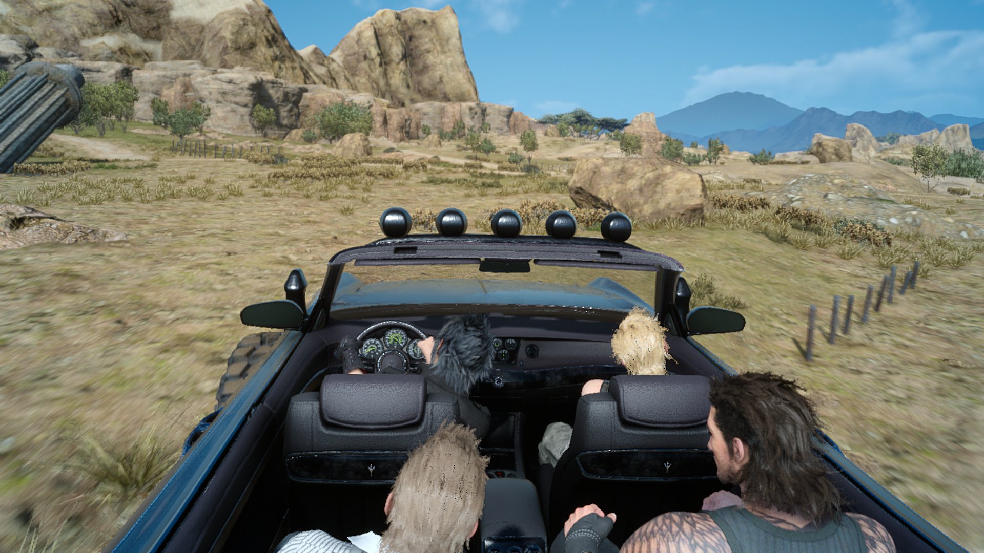 I  upgraded the Regalia into its off-road variant and wept with joy when Noctis and Prompto high-fived after jumping over a big rock. (Screenshot: Square Enix)