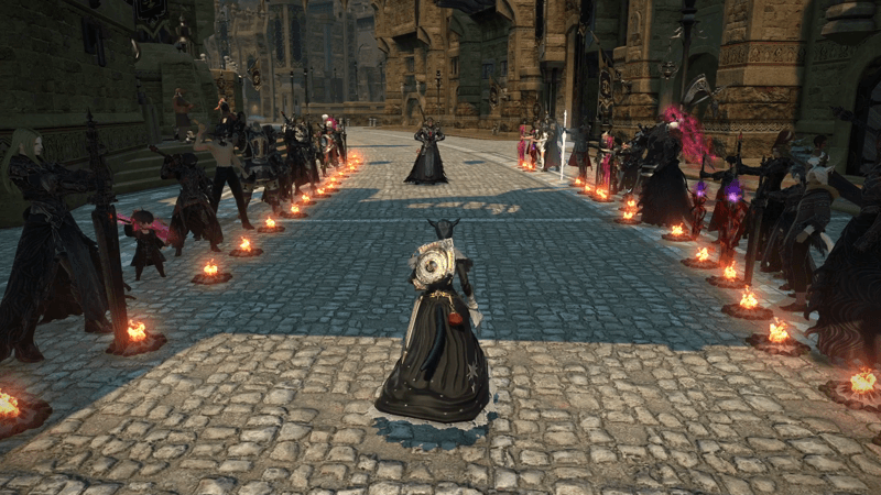 On Balmung, the line of mourners stretches through the city streets. (Gif: Square Enix / Kotaku)