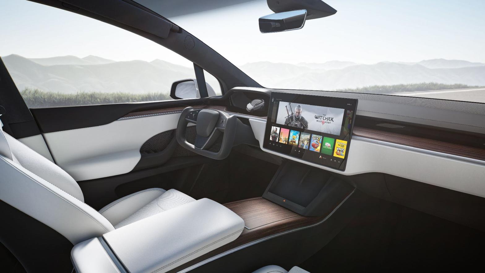 The entertainment system of a Tesla Model X showing an entirely different CDPR game. (Photo: Tesla)