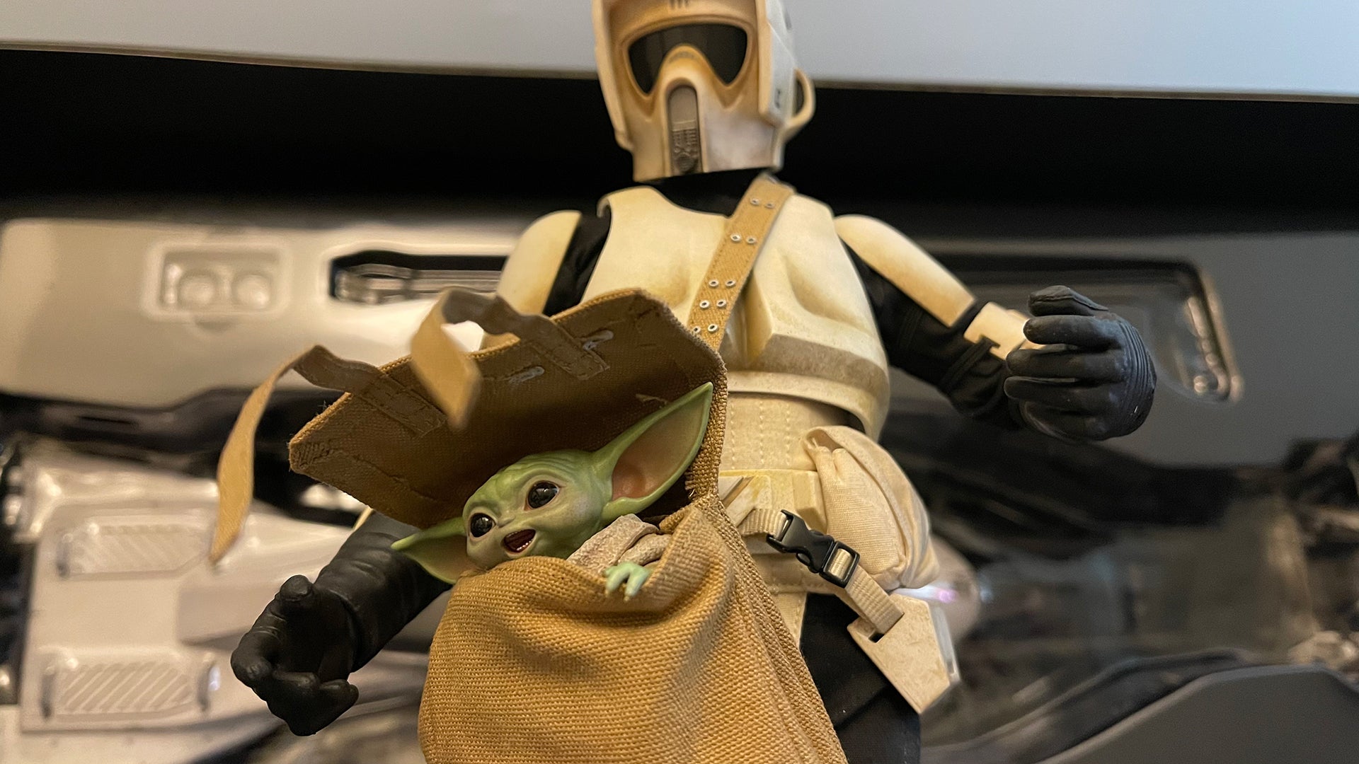 Does Baby Yoda count as a carry on?  (Photo: Mike Fahey / Kotaku)