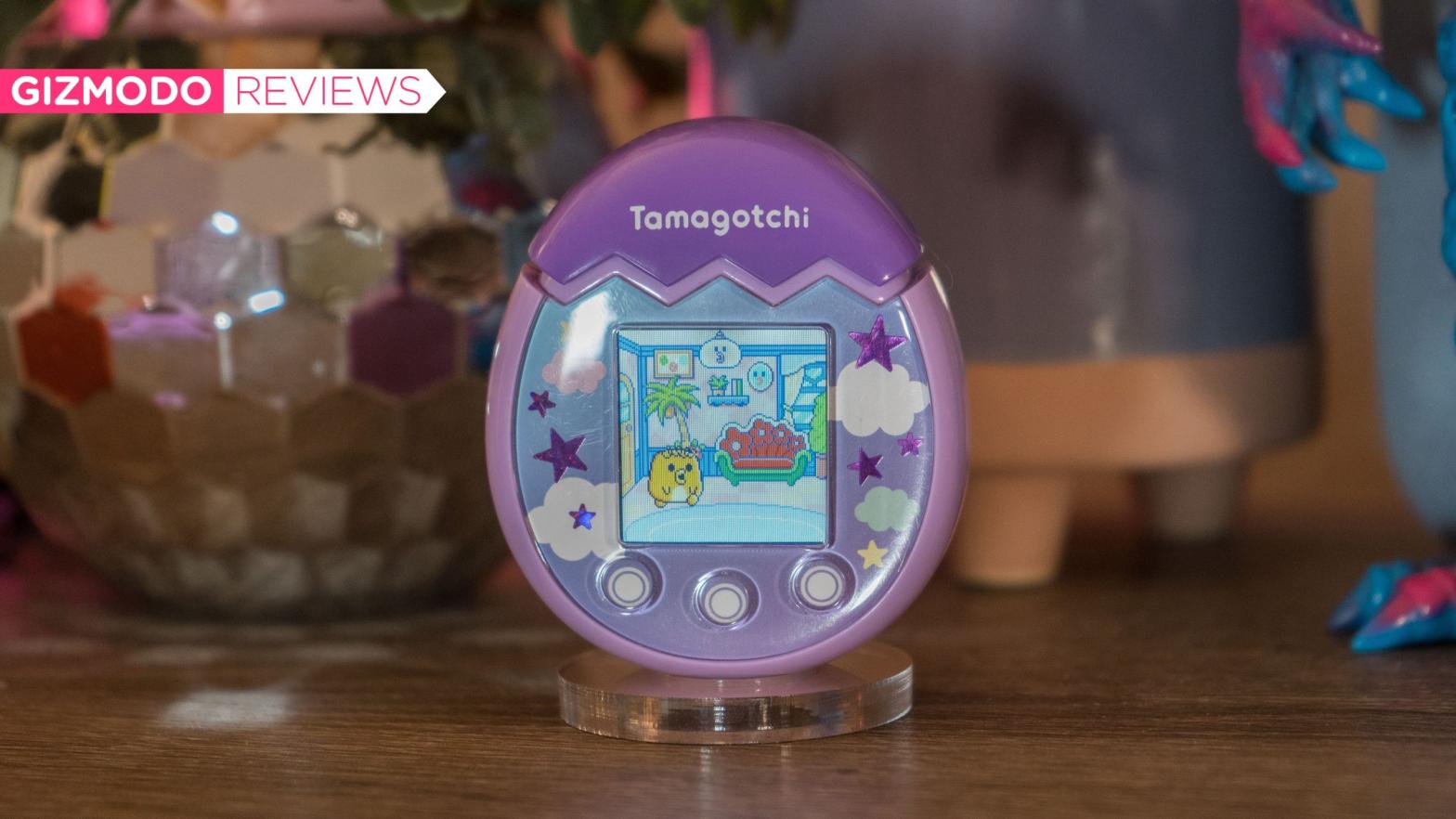 We did it, guys! We convinced my editors to let me review the new Tamagotchi!  (Photo: Florence Ion / Gizmodo)