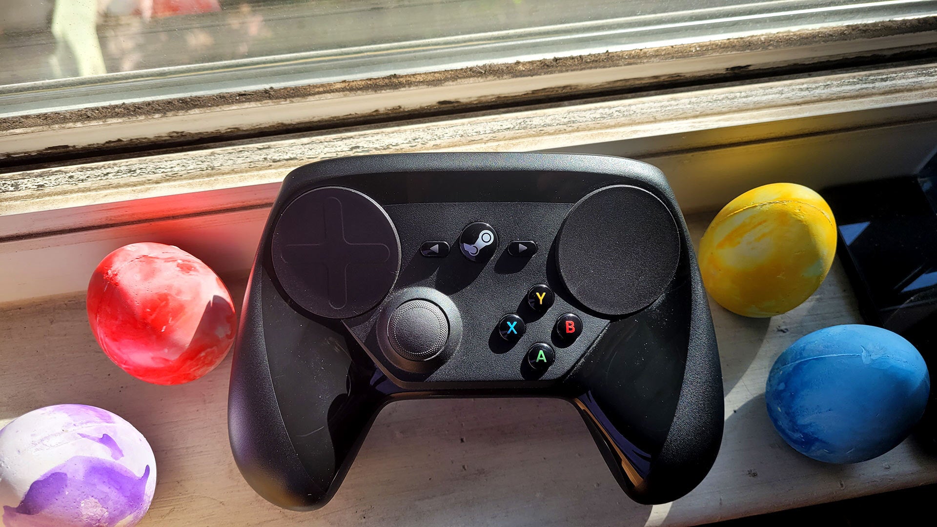  I admire the hell out of the Steam Controller (pictured here with optional eggs) even if I spend more time configuring it than playing. 