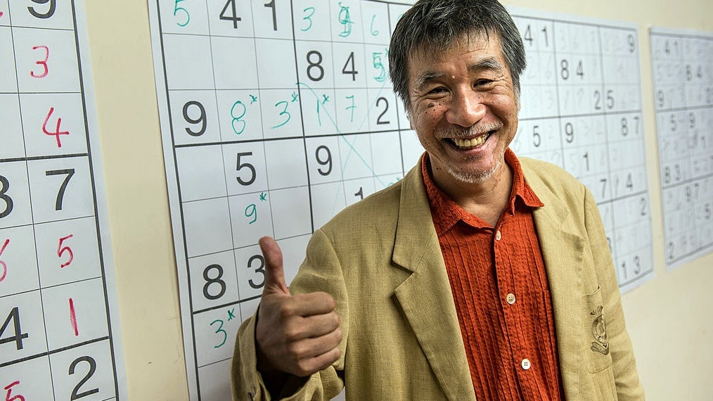 Maki Kaji appeared at Sudoku tournaments all over the world, such as this 2012 one in Brazil. (Photo: Yasuyoshi Chiba/AFP, Getty Images)