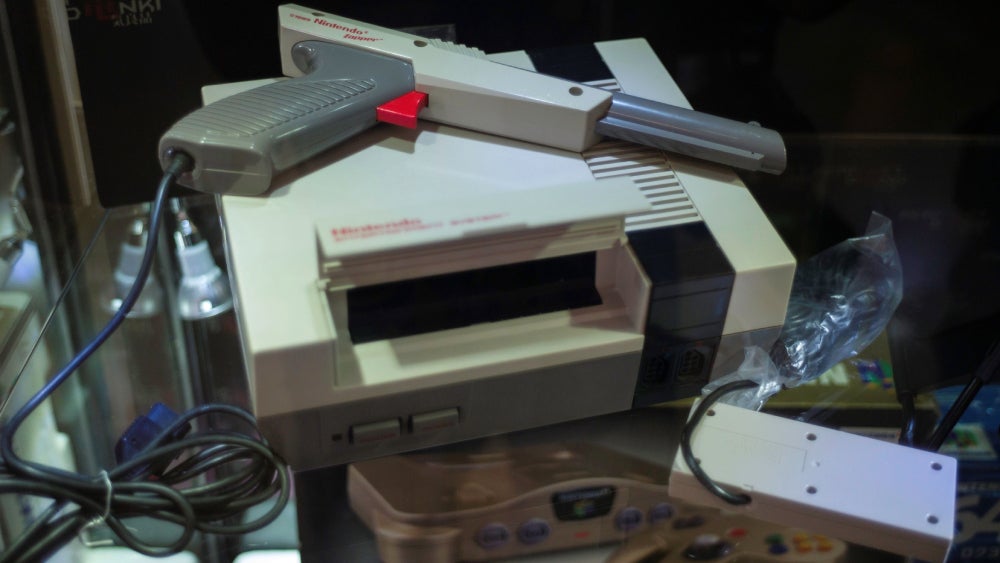 Here, a Nintendo Entertainment System with an early production Zapper was on display at a retro gaming expo in Hong Kong in 2017.  (Photo: TENGKU BAHAR/AFP, Getty Images)