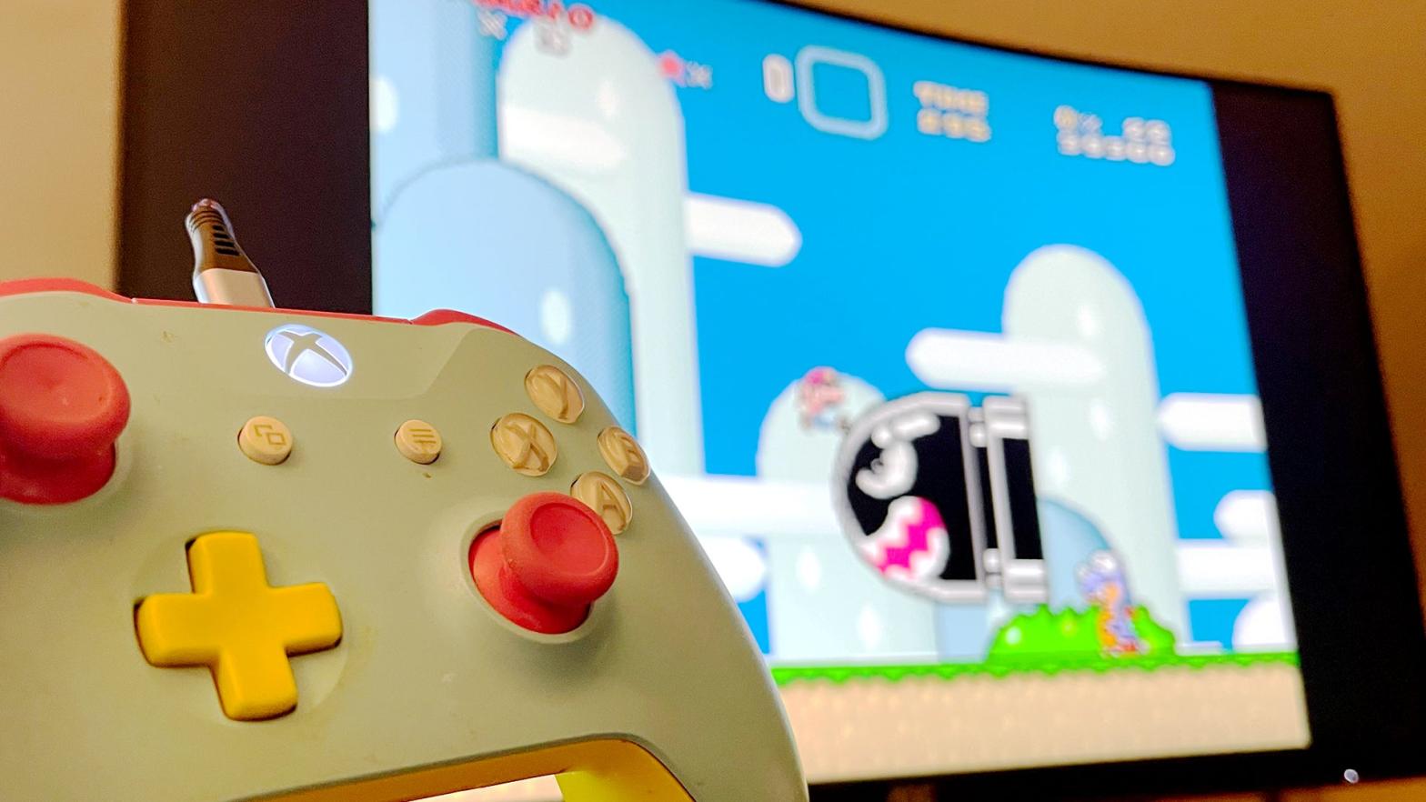 Just playing some Super Mario World with my Xbox One controller on a box that thinks it's a Super NES.  (Photo: Kotaku / Mike Fahey)