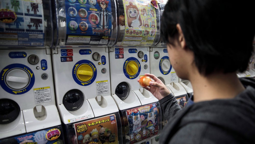 Capsule toys only cost a few bucks. Children cost much more.  (Photo: BEHROUZ MEHRI/AFP, Getty Images)
