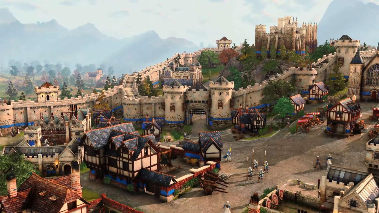 A fully built town in age of empires 4 with stone walls and stables