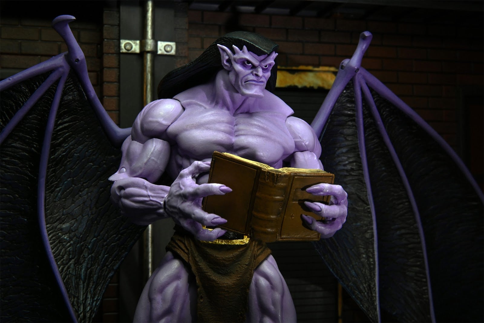 Who doesn't love a good book? (Photo: NECA)