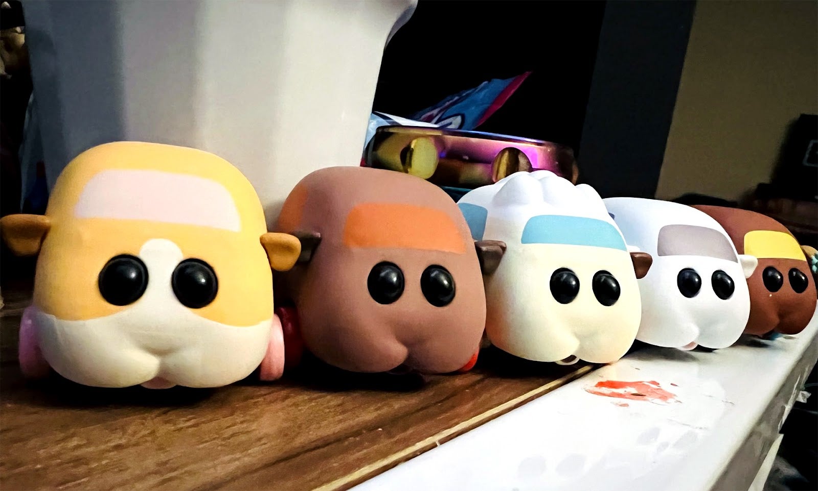 Just ignore the bit of red on my desk and focus on the guinea pig cars.  (Photo: Mike Fahey / Kotaku)