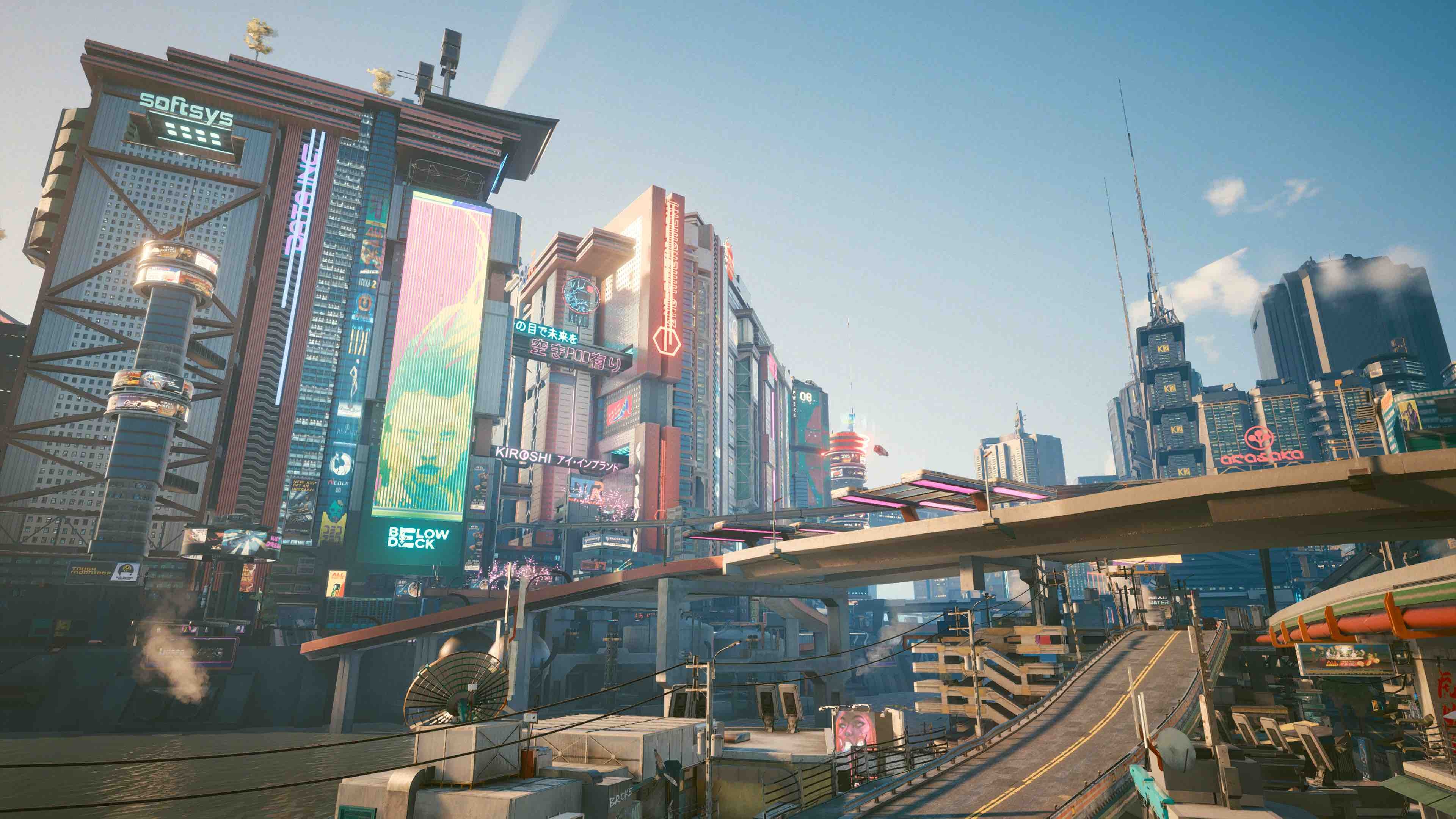 Night City, seen here as (sorry, I can't help it!) Day City, is as packed with highways as it is with dense development. (Screenshot: CDPR / Kotaku)