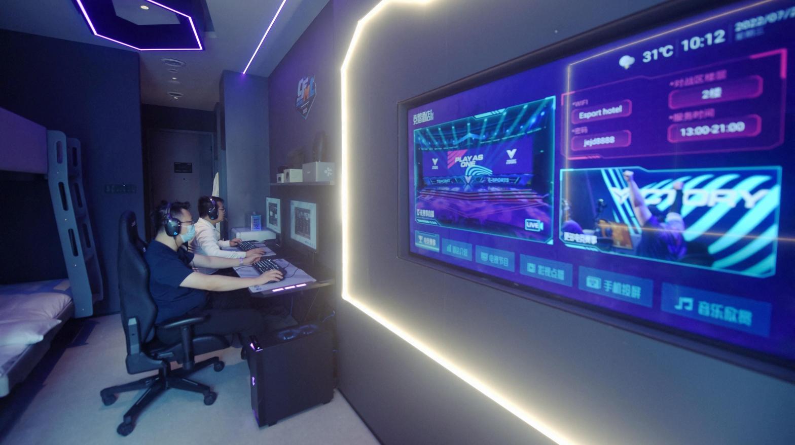 An eSports-themed hotel in Hangzhou, China is just one of the ways China's gaming scene is reliant on long game sessions, something that China has worked hard to curb.  (Photo: STR/AFP, Getty Images)