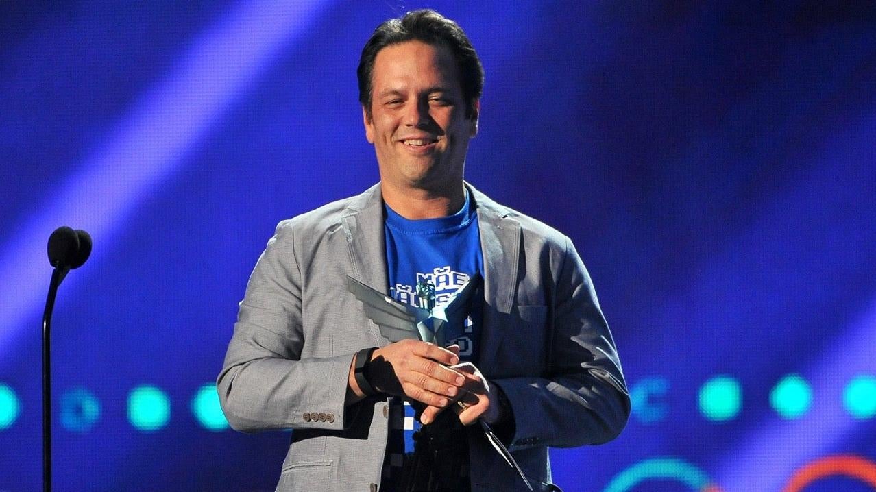 Xbox Game Studios CEO Phil Spencer stands onstage at the 2015 Game Awards. (Photo: Allen Berezovsky, Getty Images)