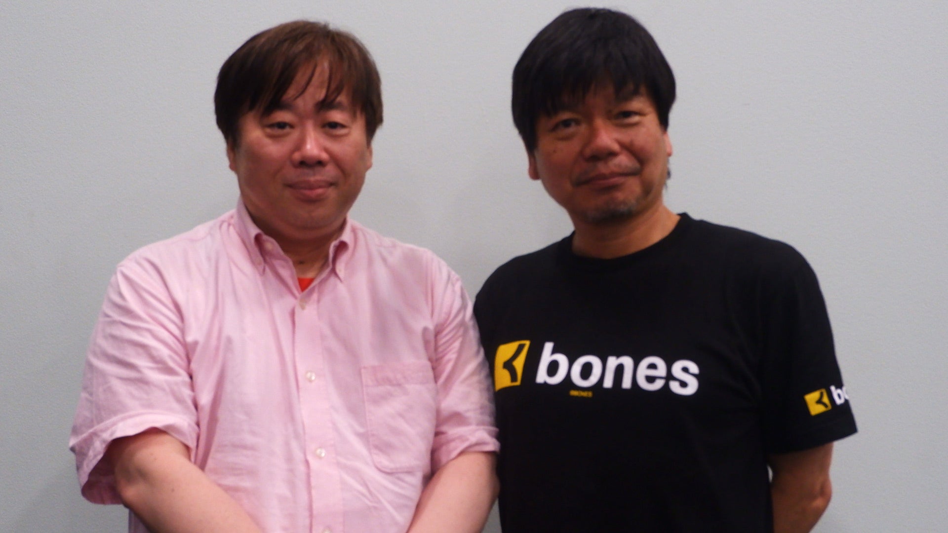 Toshihiro Kawamoto (left) and Masahiko Minami (right) at Anime Expo 2023. (Photo: Kotaku)